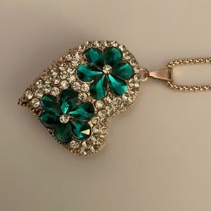 Long golden chain, large Rhinestone heart pendant.